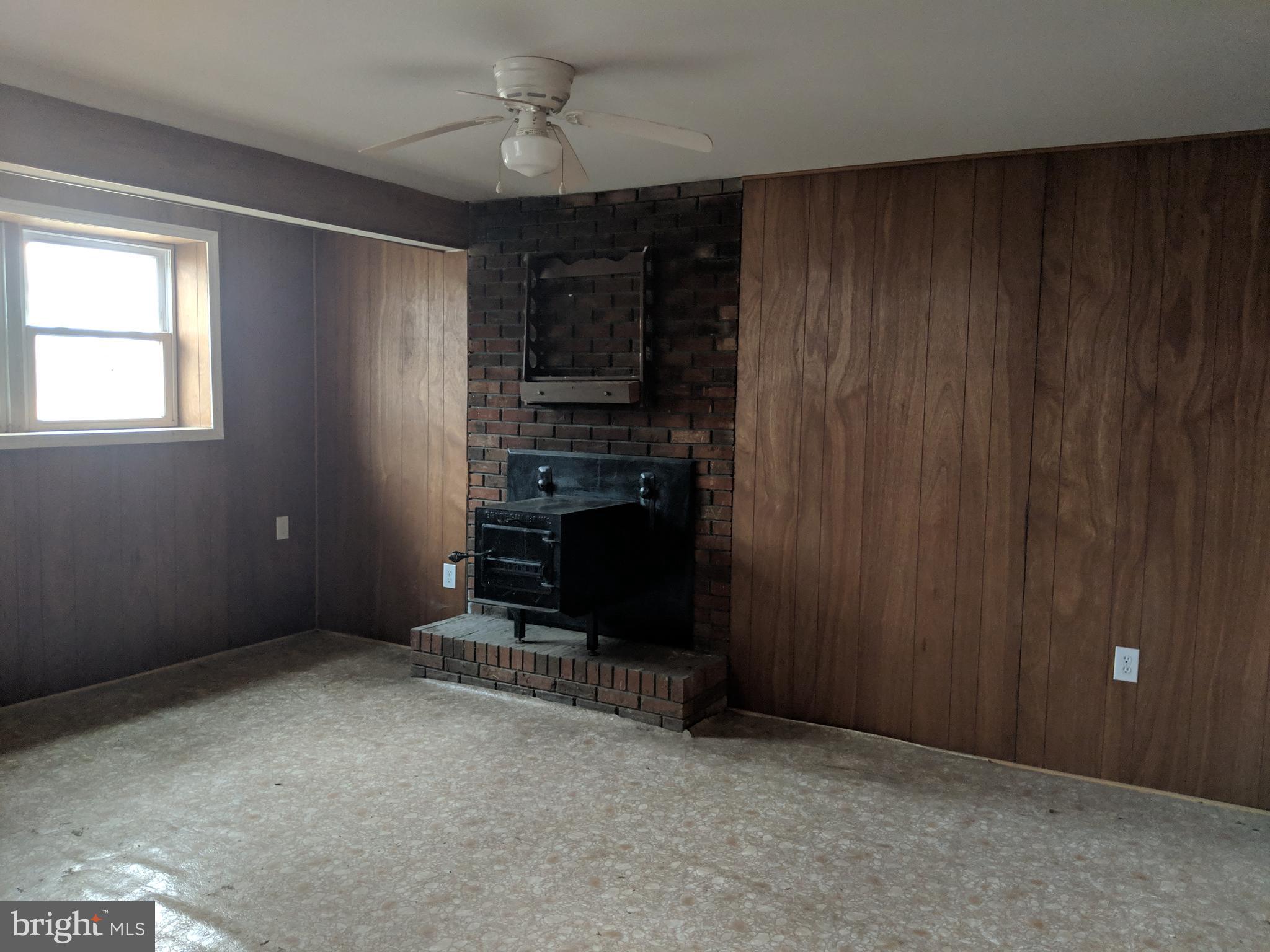 770 Elmhurst Road Severn, MD 21144 - Photo 21 of 26 a room with furniture and a window