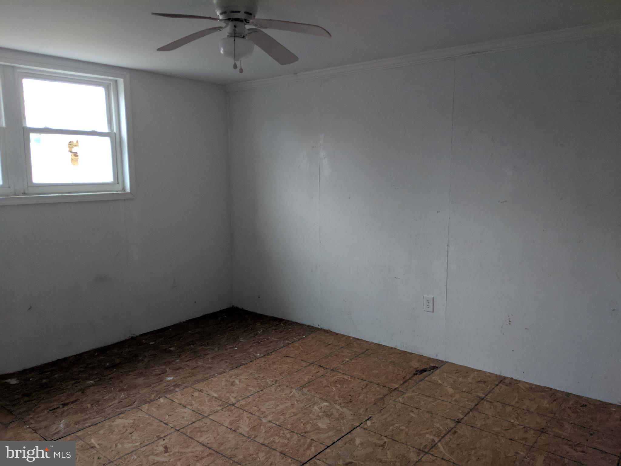 770 Elmhurst Road Severn, MD 21144 - Photo 23 of 26 an empty room with a window
