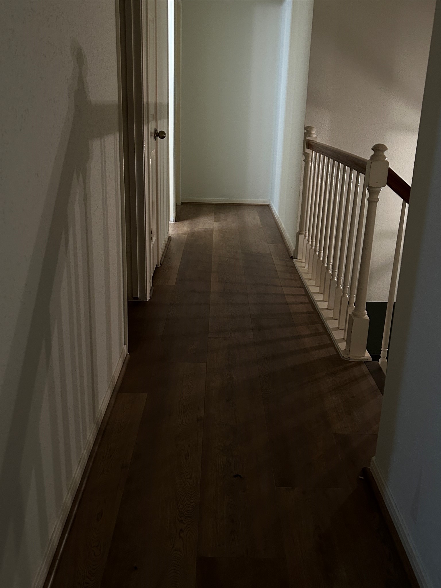 3106 Rimrock Drive Missouri City, TX 77459 - Photo 12 of 23 2nd floor hall way with new laminate flooring