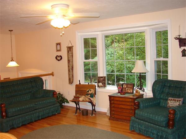 39 Old Stage Road Chelmsford, MA 01824 - Photo 8 of 25 a living room with furniture and a large window