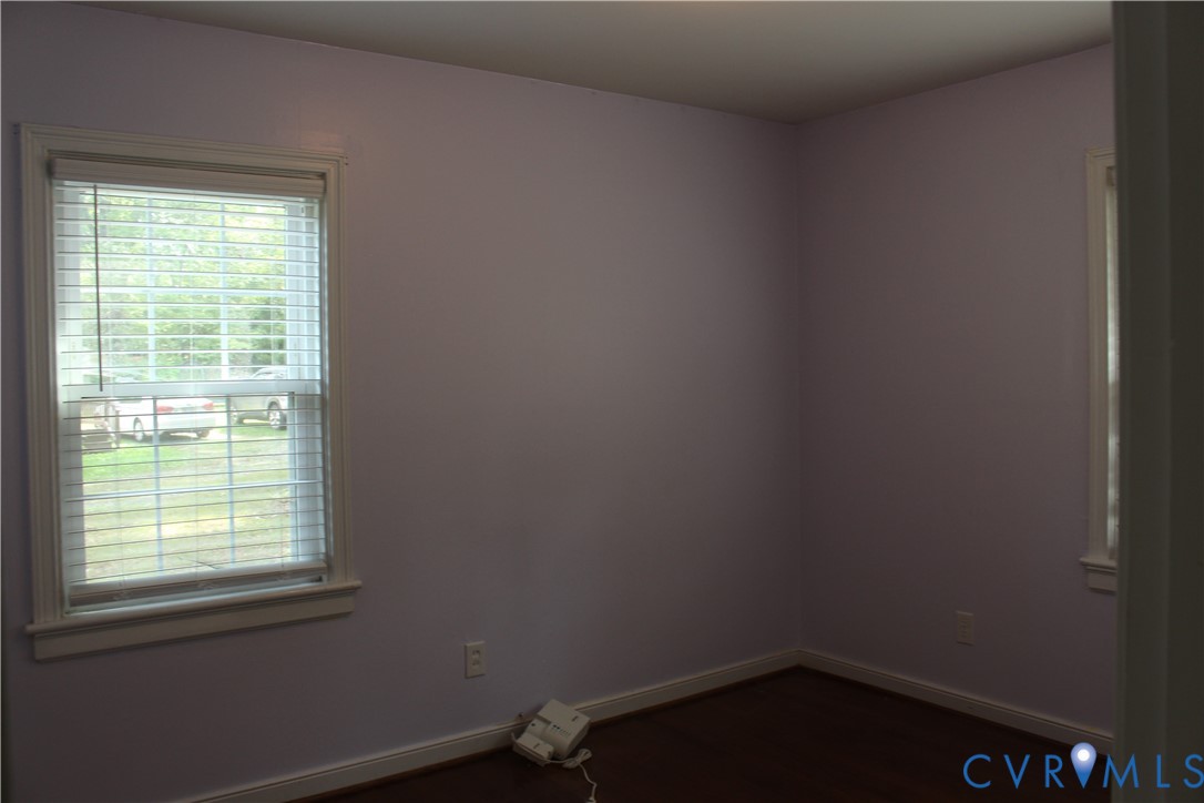 10035 Wycliff Road Chesterfield, VA 23236 - Photo 6 of 12 Wood-finish flooring with light purple wall tones