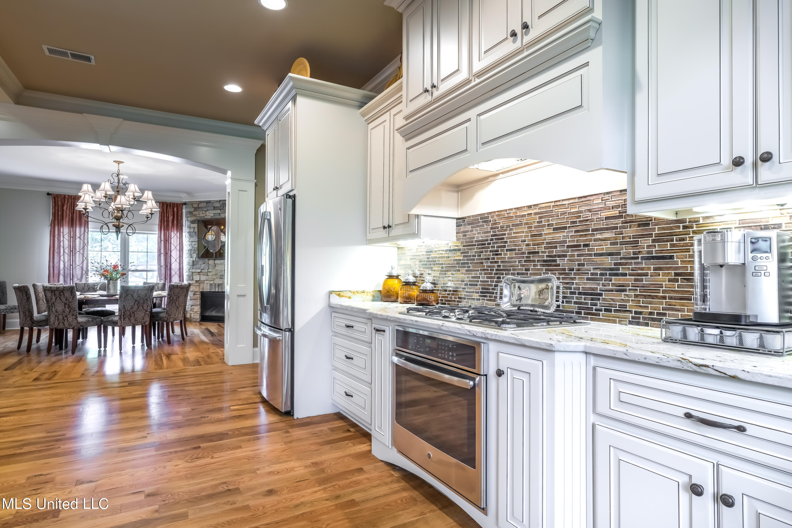 6801 Vaiden Road Hernando, MS 38632 - Photo 13 of 65 kitchen into dining