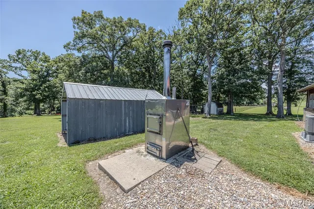 $450,000 | 2962 County Road 496, New Bloomfield, MO 65063