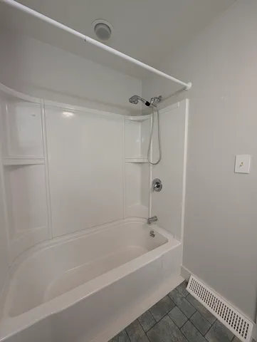 a bathroom with a bathtub