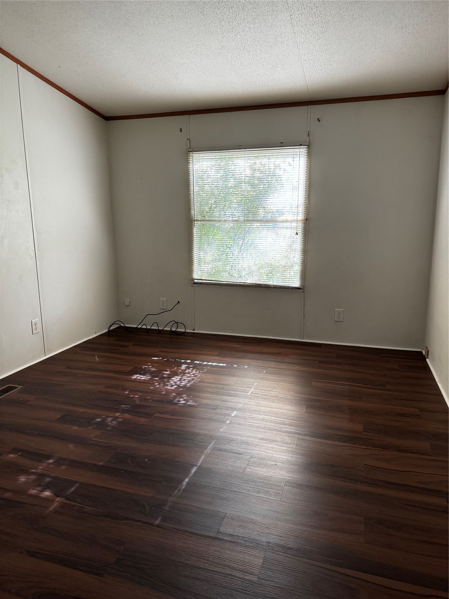 15930 Boss Gaston Road Sugar Land, TX 77498 - Photo 10 of 20 an empty room with wooden floor and windows