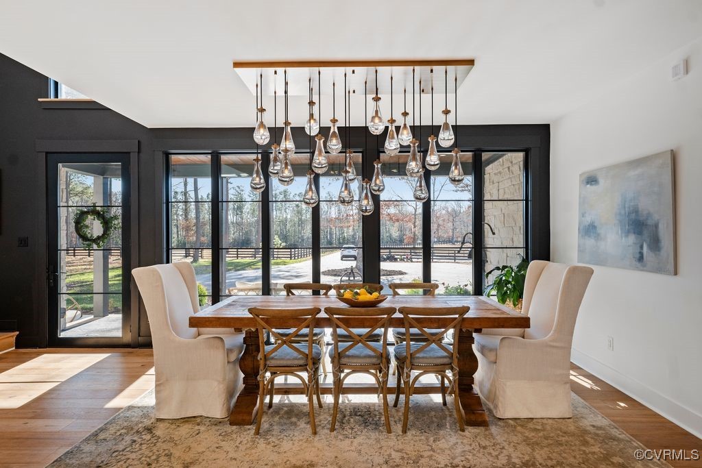 9600 Woodpecker Road Chesterfield, VA 23838 - Photo 4 of 33 a dining room with furniture and large windows