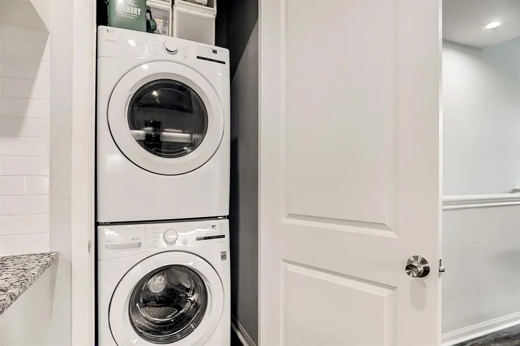 4906 Paradigm Ln Spring Spring, TX 77379 - Photo 14 of 17 a close up view of a washer and dryer