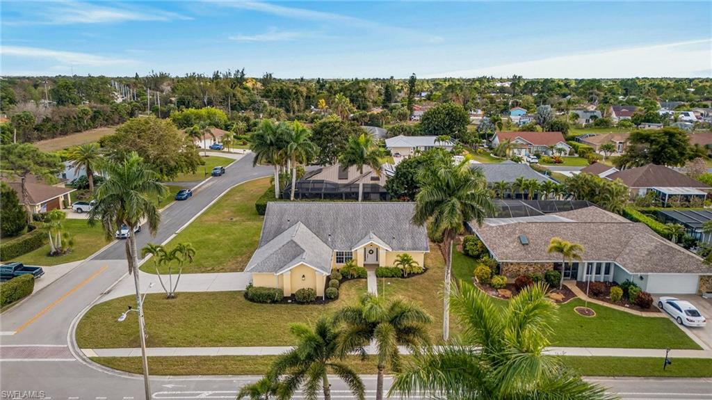 390 St Andrews Boulevard Naples, FL 34113 - Photo 2 of 42 Aerial view of residential area