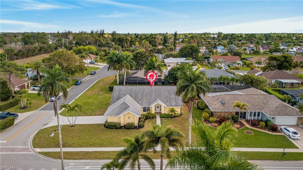 390 St Andrews Boulevard Naples, FL 34113 - Photo 29 of 42 Aerial perspective of suburban area