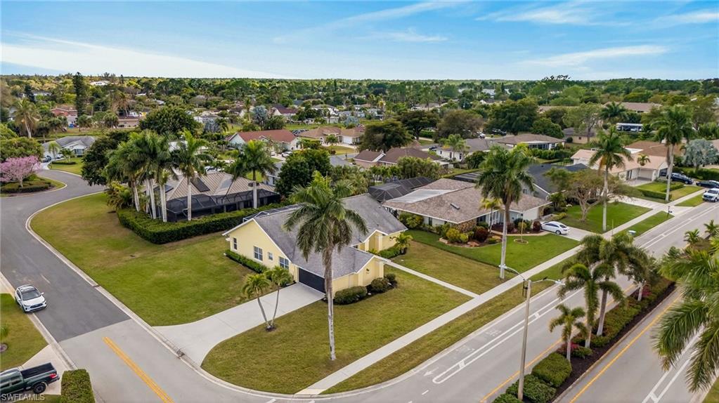390 St Andrews Boulevard Naples, FL 34113 - Photo 30 of 42 Aerial perspective of suburban area