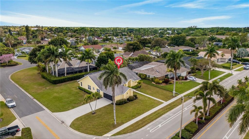 390 St Andrews Boulevard Naples, FL 34113 - Photo 31 of 42 Aerial view of residential area