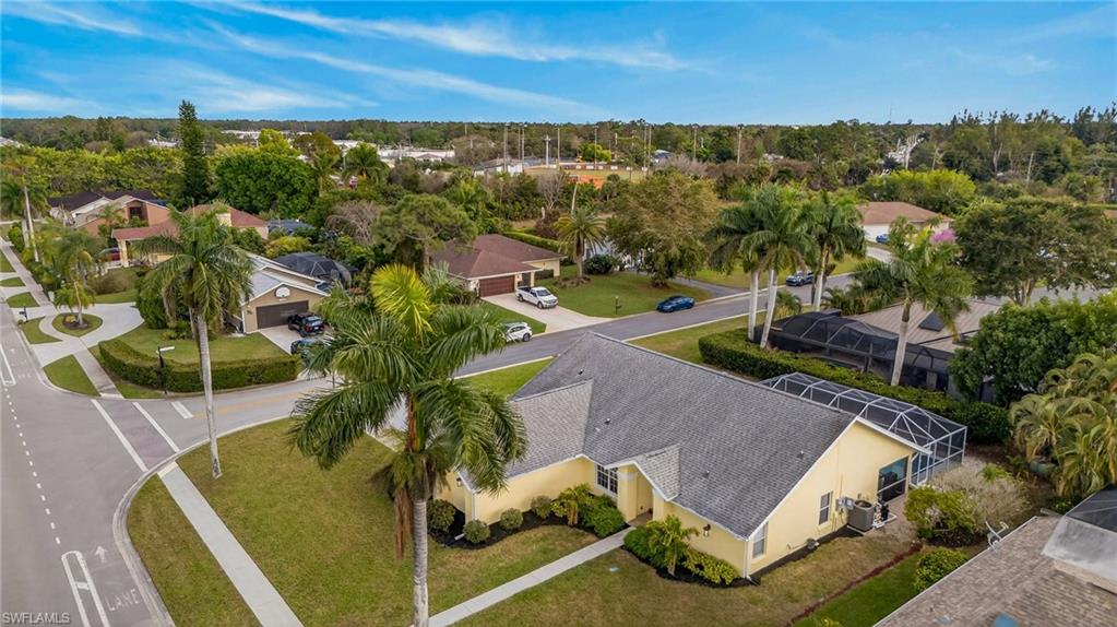 390 St Andrews Boulevard Naples, FL 34113 - Photo 32 of 42 Aerial view of residential area