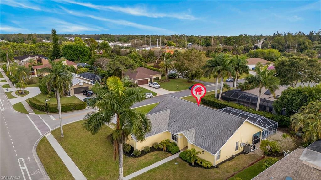 390 St Andrews Boulevard Naples, FL 34113 - Photo 33 of 42 Aerial view of residential area