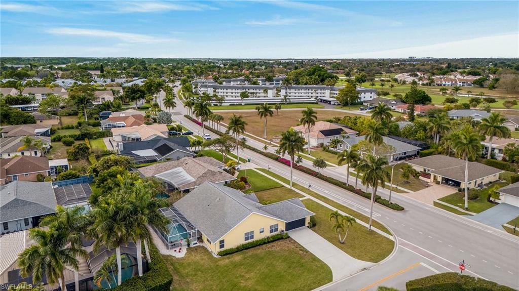 390 St Andrews Boulevard Naples, FL 34113 - Photo 36 of 42 Aerial view of residential area