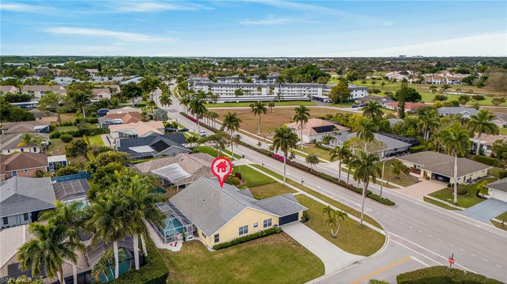 390 St Andrews Boulevard Naples, FL 34113 - Photo 37 of 42 Aerial view of residential area