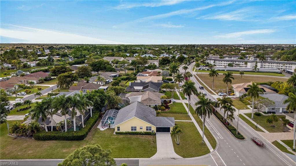 390 St Andrews Boulevard Naples, FL 34113 - Photo 38 of 42 Aerial perspective of suburban area