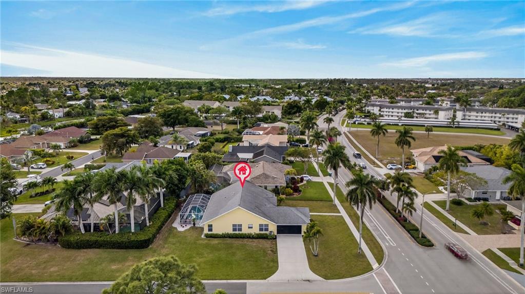 390 St Andrews Boulevard Naples, FL 34113 - Photo 39 of 42 Aerial perspective of suburban area