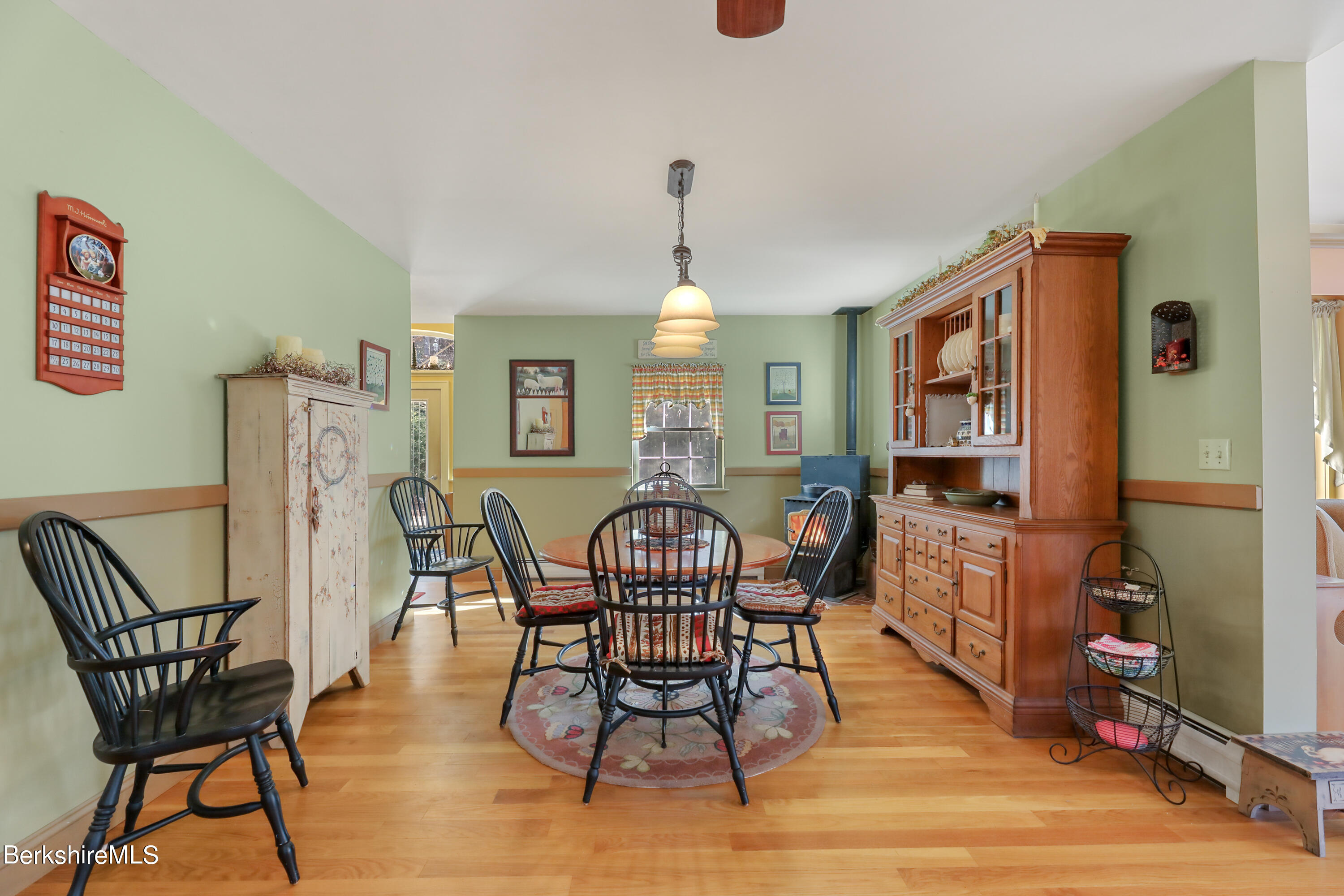 20 Ray Hubbard Road Otis, MA 01029 - Photo 12 of 59 a view of a dining room with furniture and wooden floor