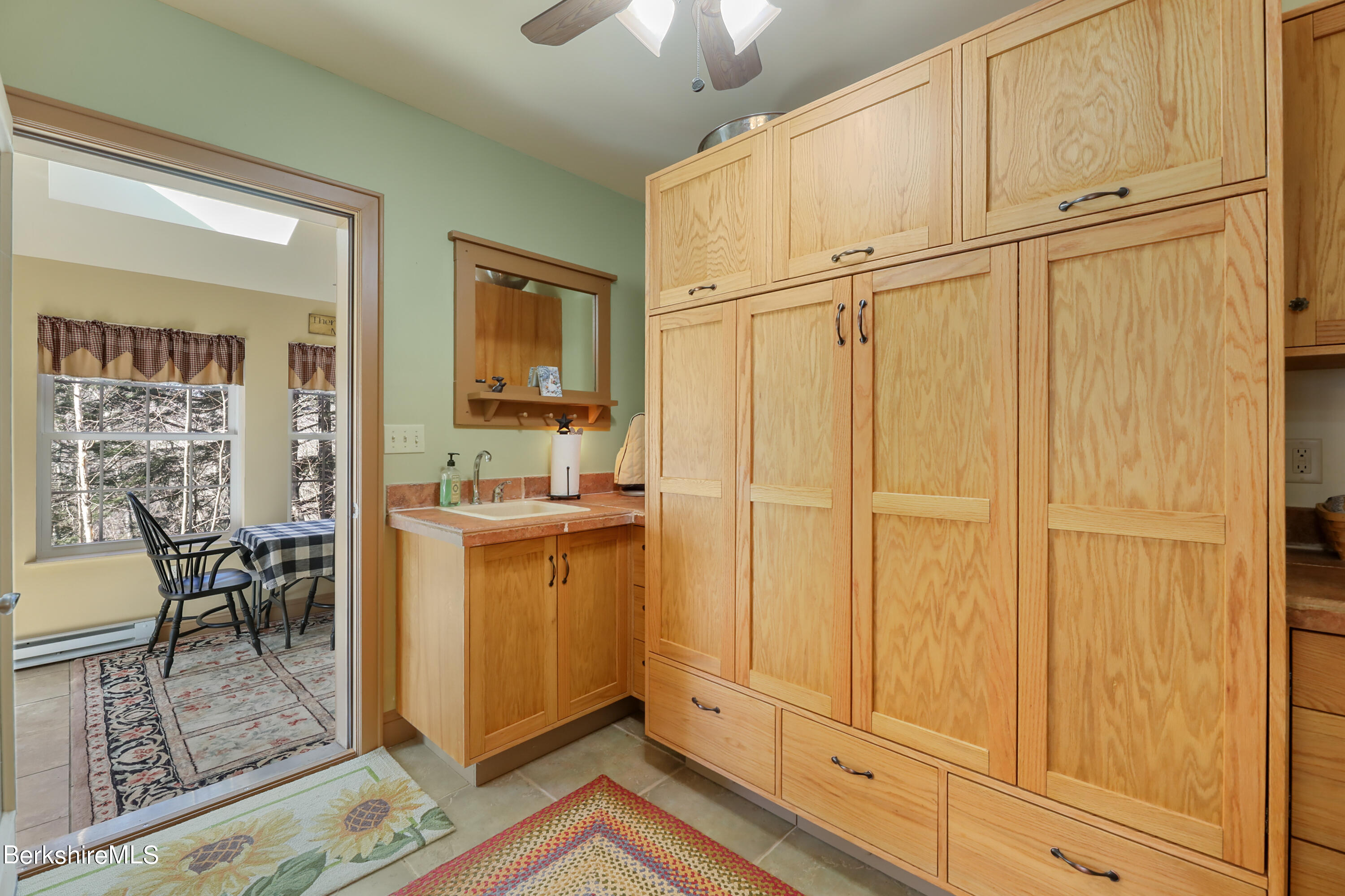 20 Ray Hubbard Road Otis, MA 01029 - Photo 23 of 59 a view of a hallway with wooden floor and cabinet