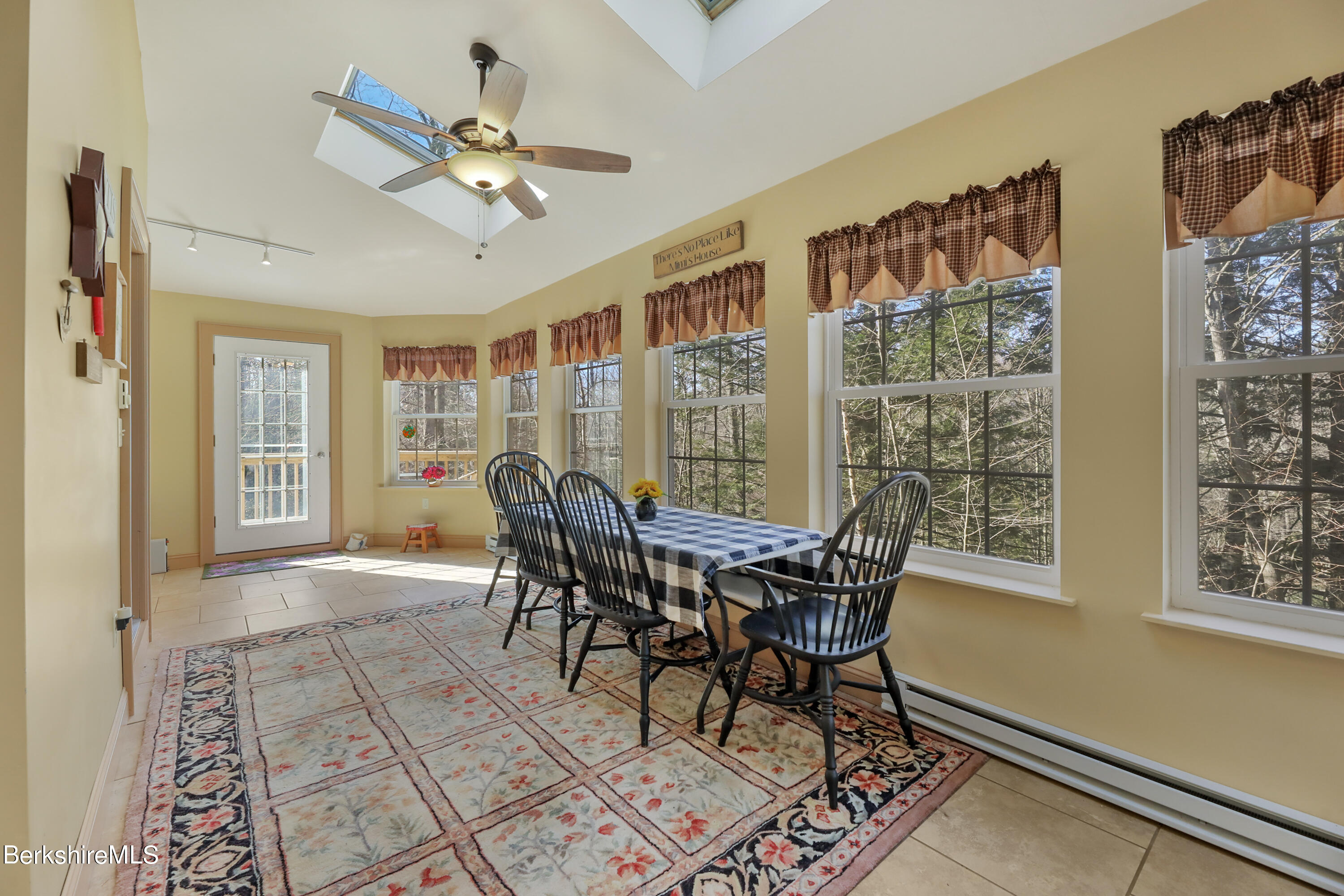 20 Ray Hubbard Road Otis, MA 01029 - Photo 26 of 59 a view of a dining room with furniture window and wooden floor