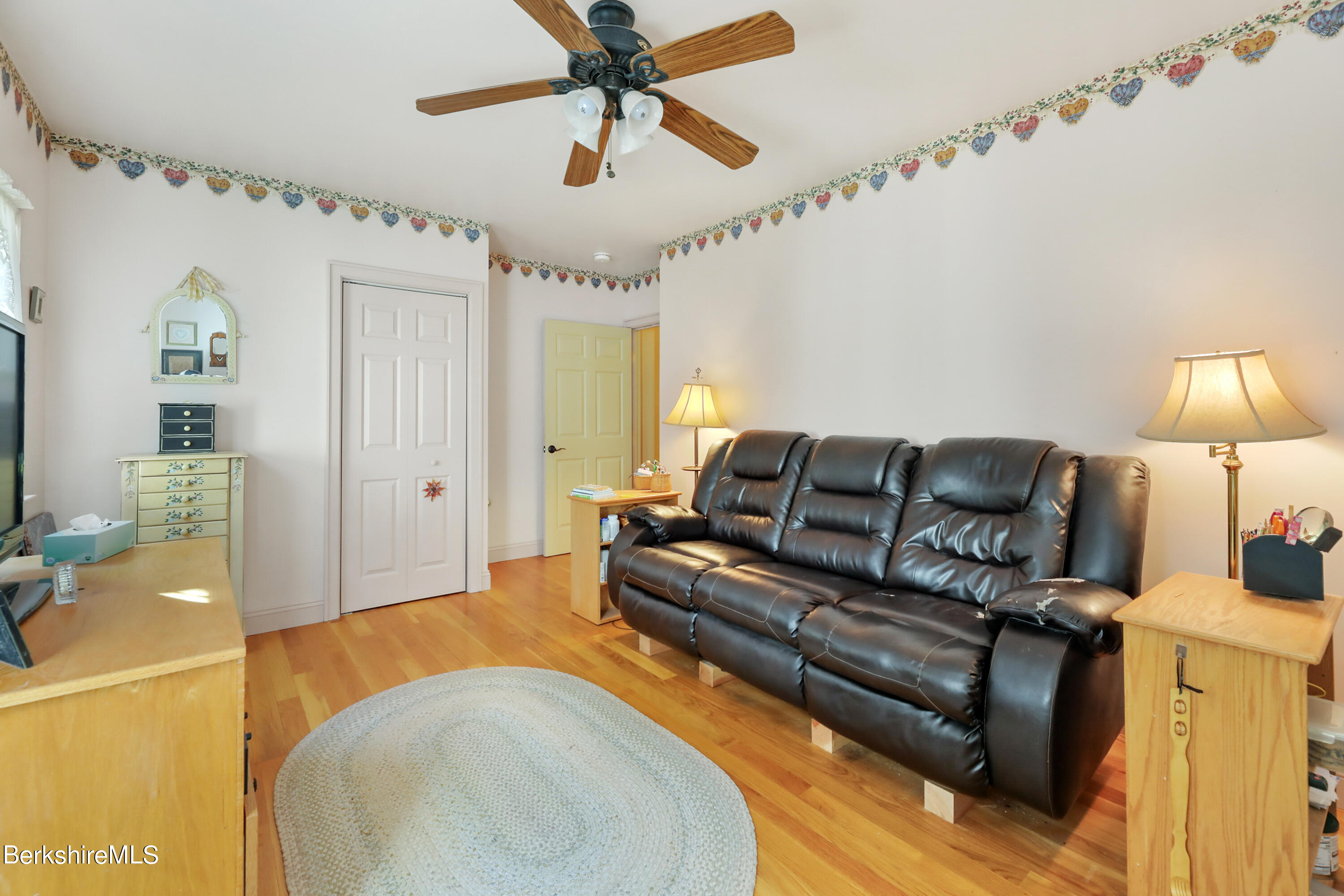 20 Ray Hubbard Road Otis, MA 01029 - Photo 28 of 59 a living room with furniture and a flat screen tv