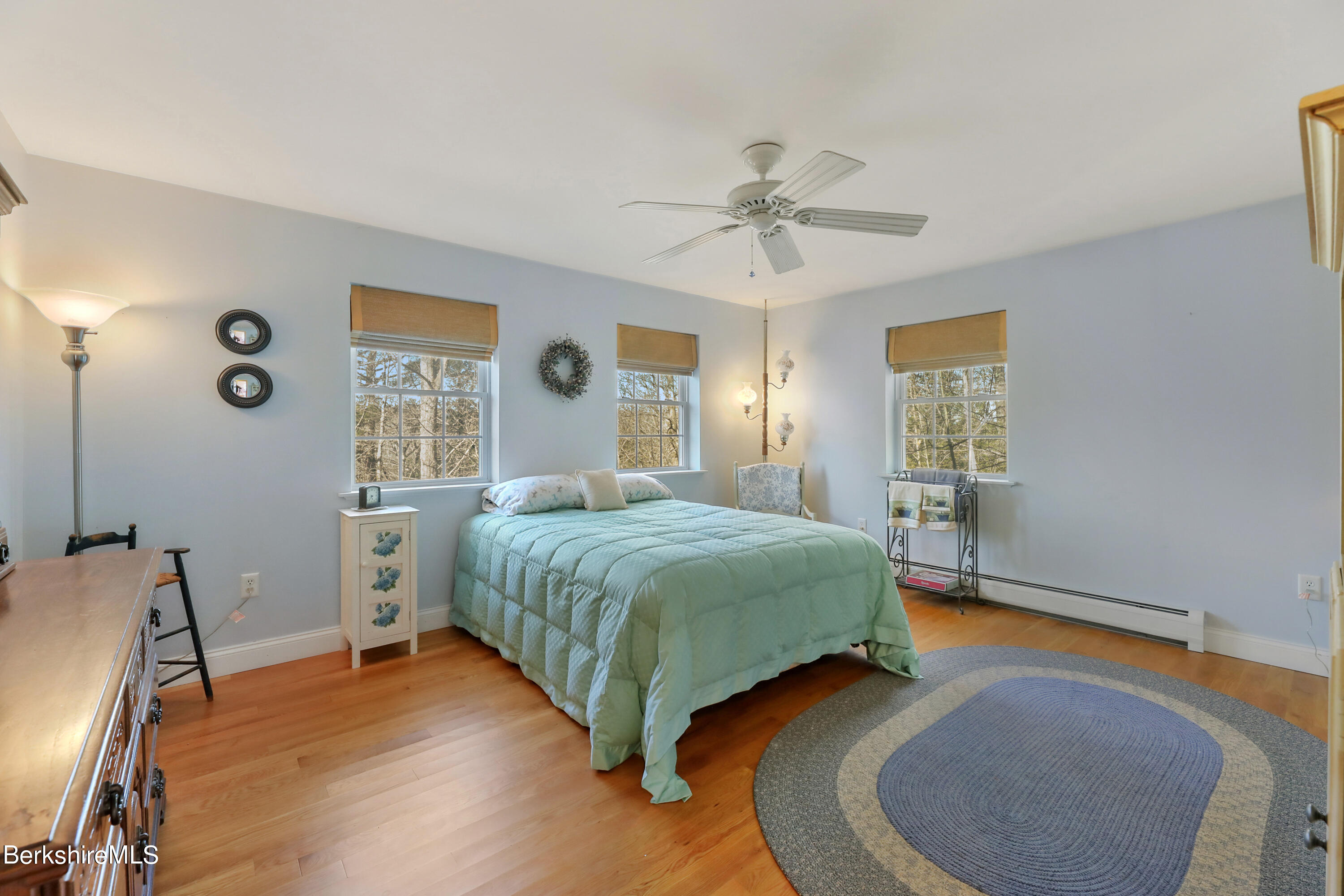 20 Ray Hubbard Road Otis, MA 01029 - Photo 36 of 59 a bedroom with a bed and wooden floor