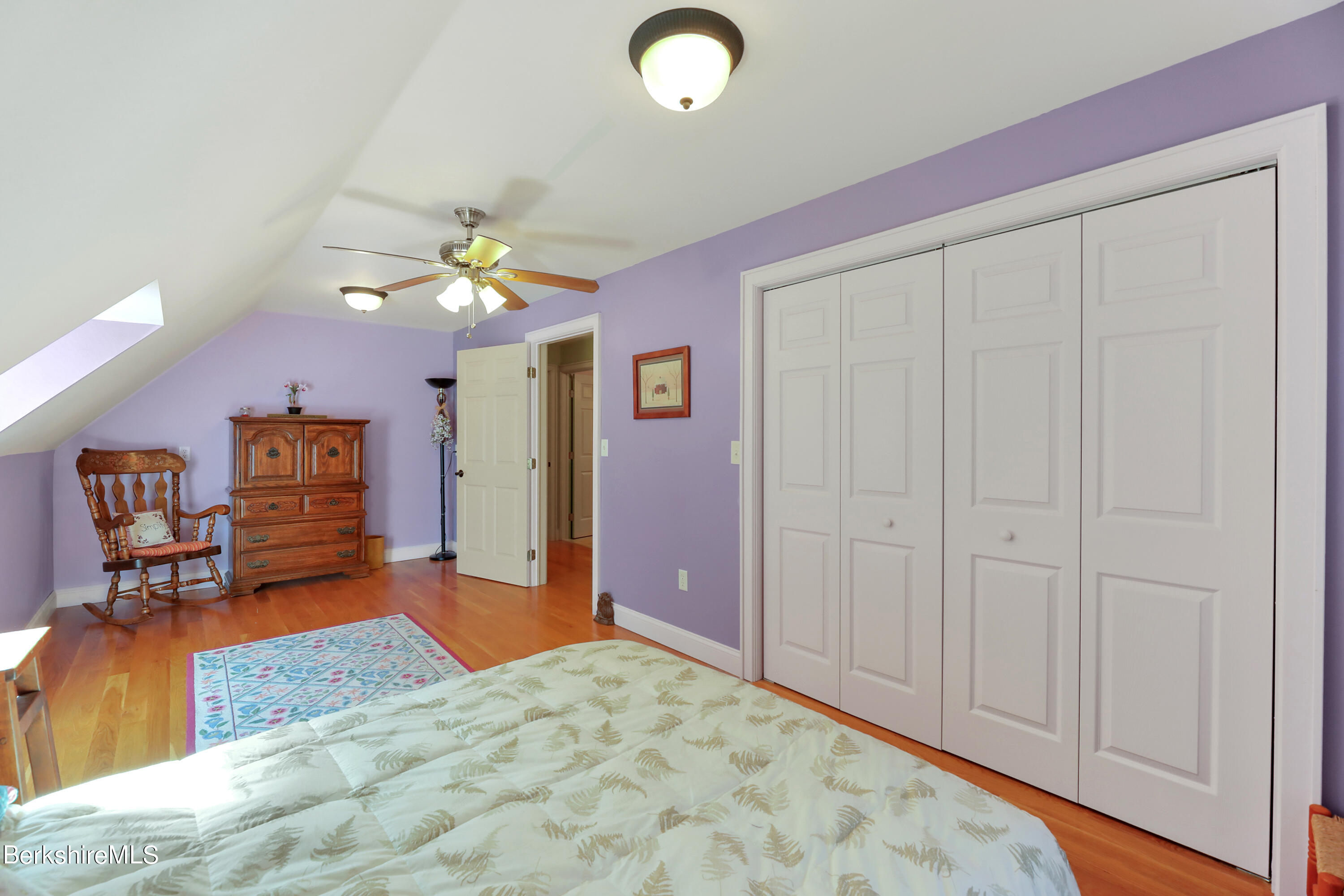 20 Ray Hubbard Road Otis, MA 01029 - Photo 39 of 59 a view of a livingroom with a chandelier fan and kitchen view