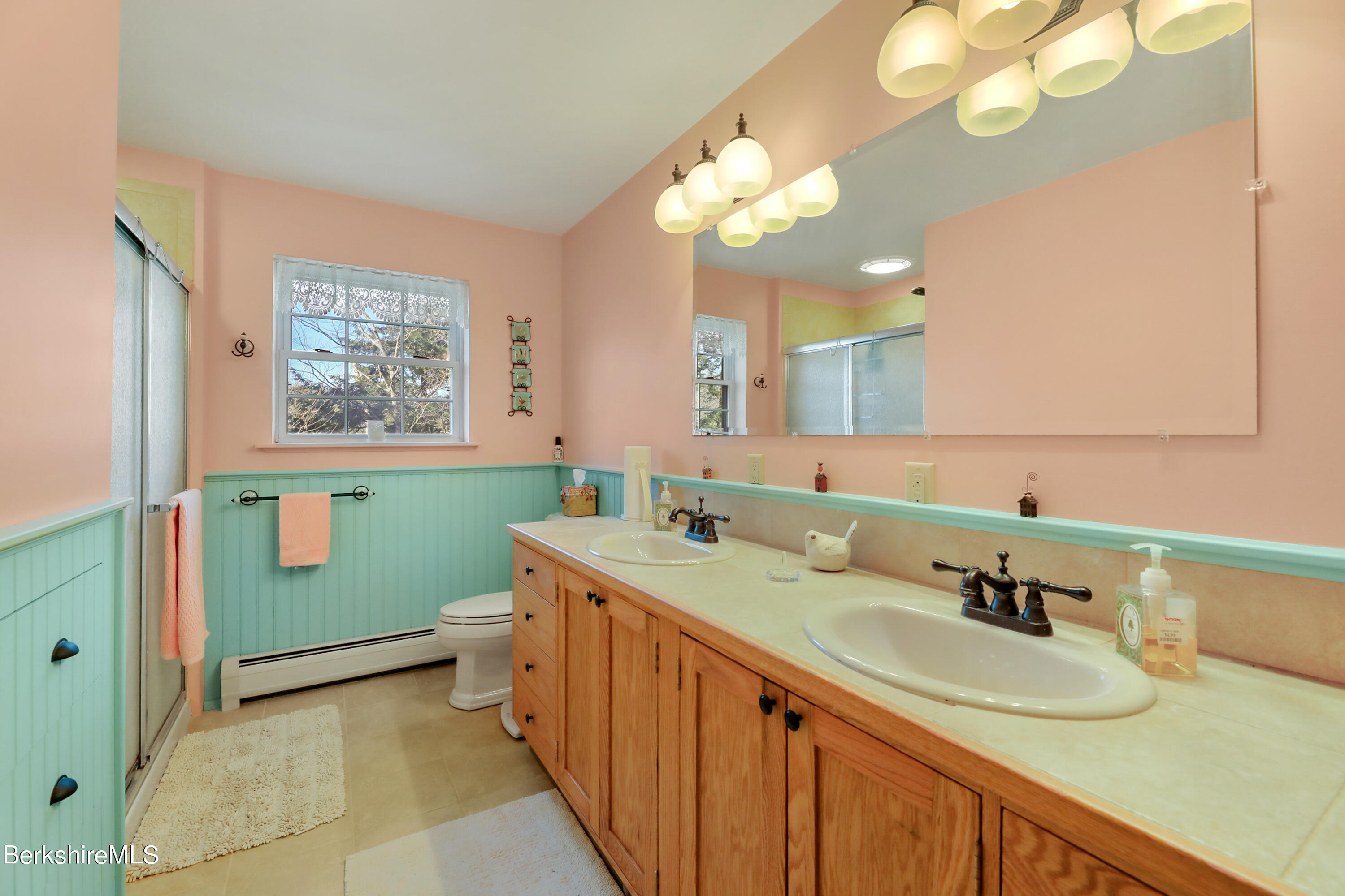 20 Ray Hubbard Road Otis, MA 01029 - Photo 44 of 59 a bathroom with a double vanity sink and a mirror