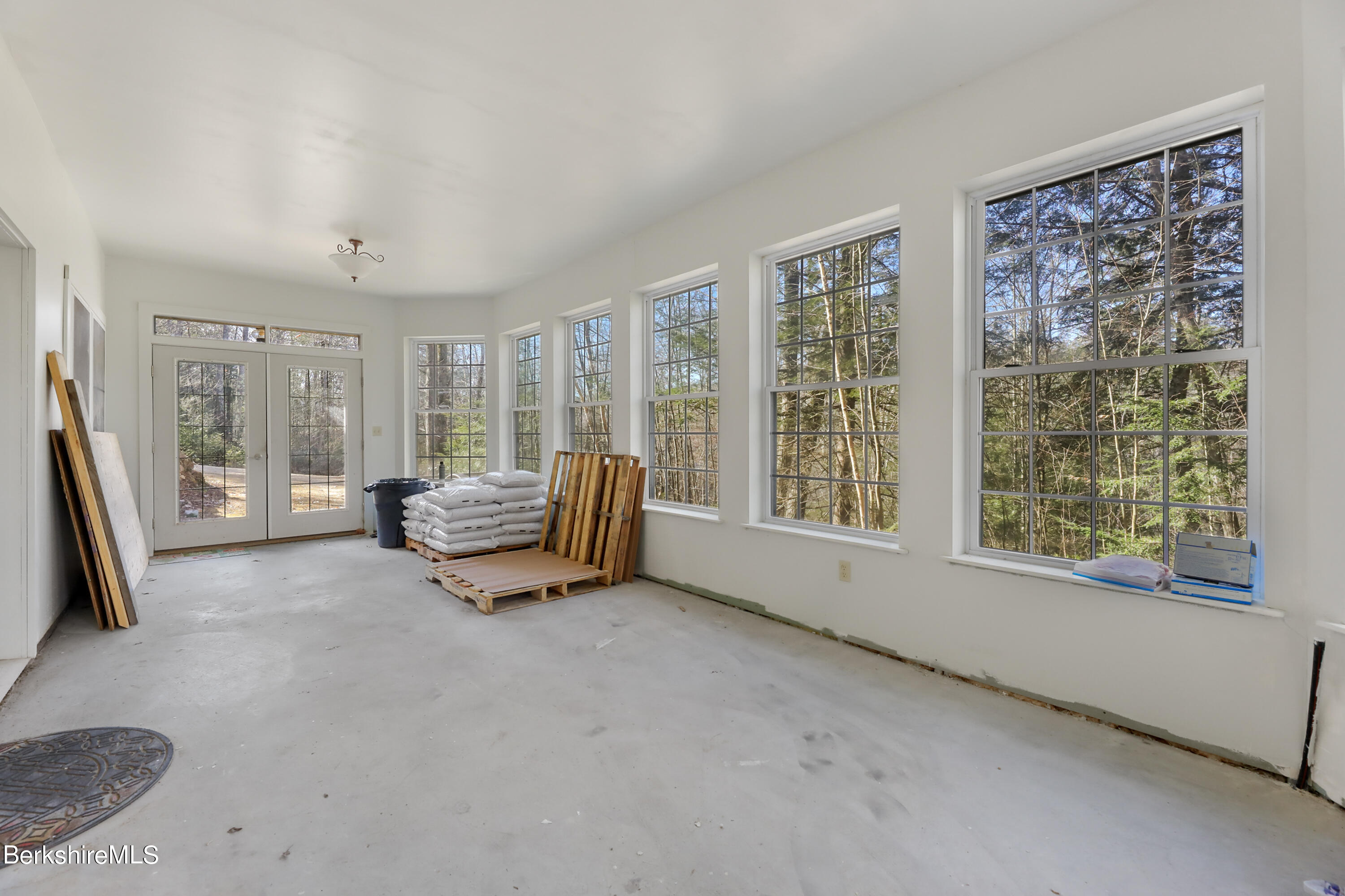 20 Ray Hubbard Road Otis, MA 01029 - Photo 48 of 59 a living room with furniture and a large window