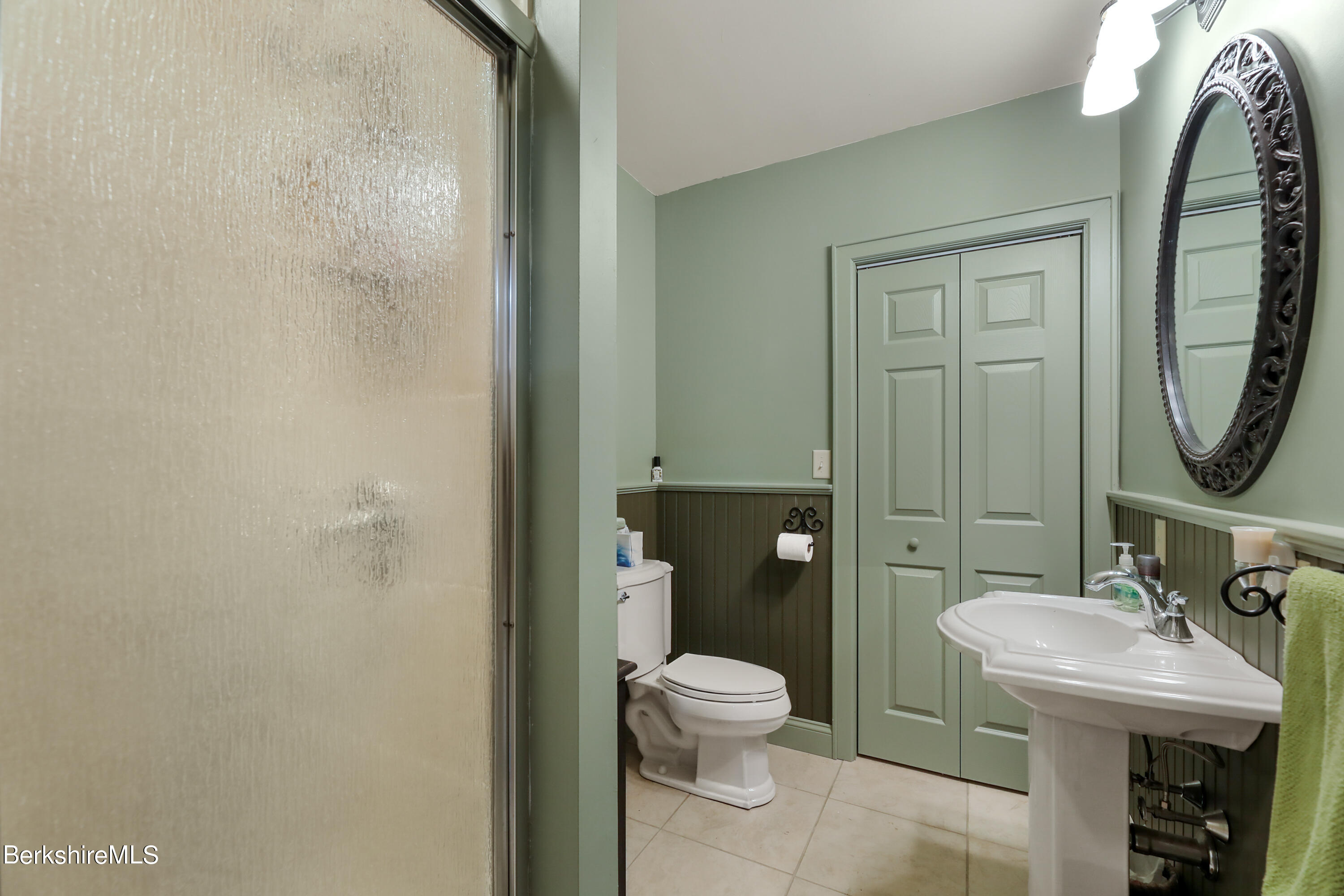 20 Ray Hubbard Road Otis, MA 01029 - Photo 49 of 59 a bathroom with a toilet sink and mirror