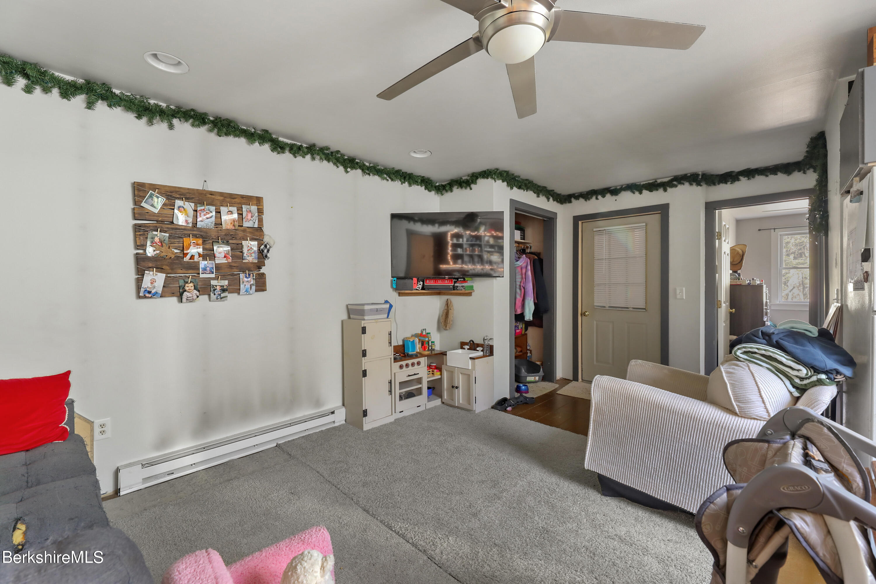20 Ray Hubbard Road Otis, MA 01029 - Photo 54 of 59 a living room with furniture and a ceiling fan