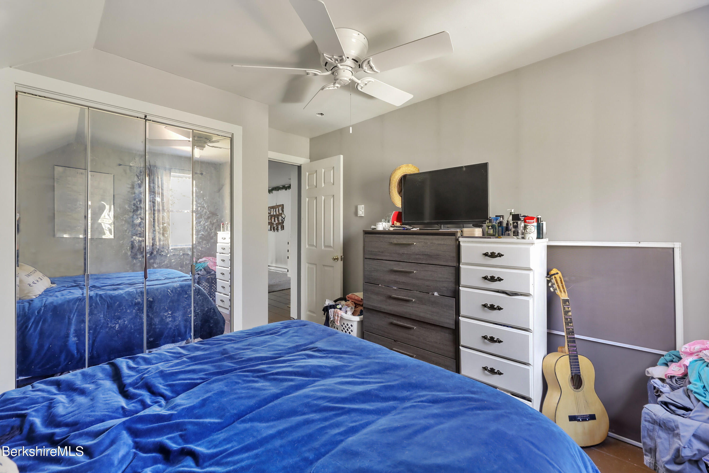 20 Ray Hubbard Road Otis, MA 01029 - Photo 57 of 59 a bedroom with a bed and a television