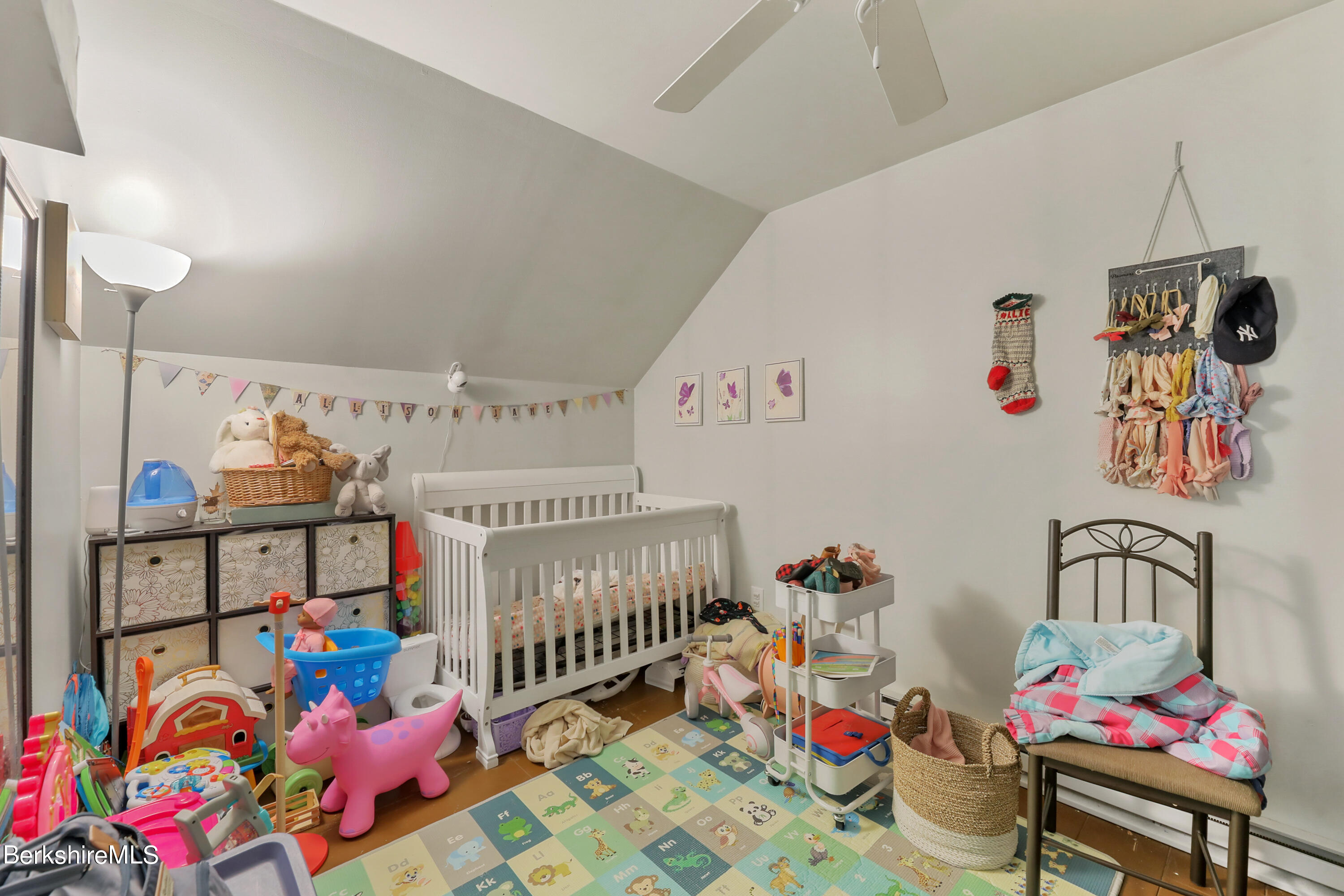 20 Ray Hubbard Road Otis, MA 01029 - Photo 58 of 59 a bedroom with baby toys and a couch