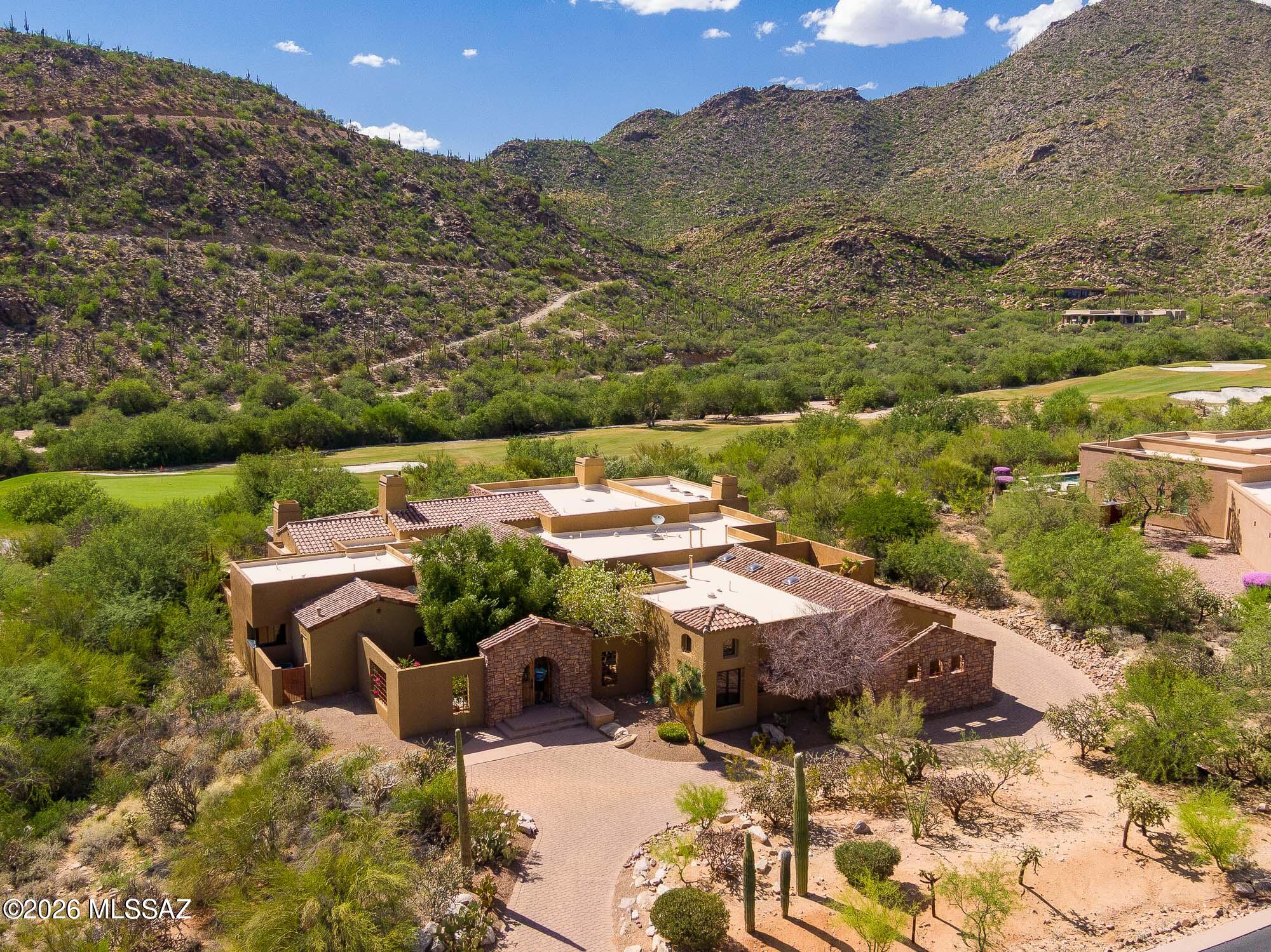 14225 North Rocking Ridge Court Marana, AZ 85658 - Photo 1 of 51 Overhead and mountain views