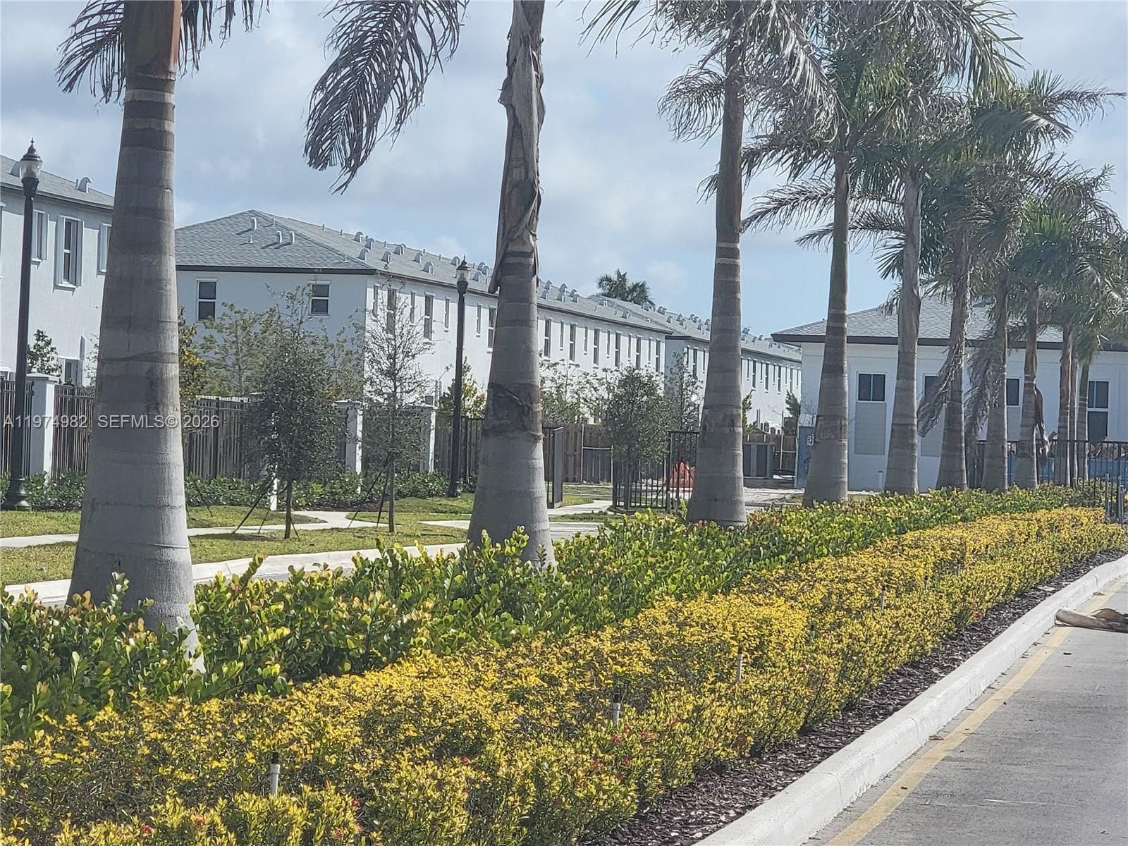 18150 Southwest 368th Street Homestead, FL 33034 - Photo 14 of 21 a view of a garden from a window