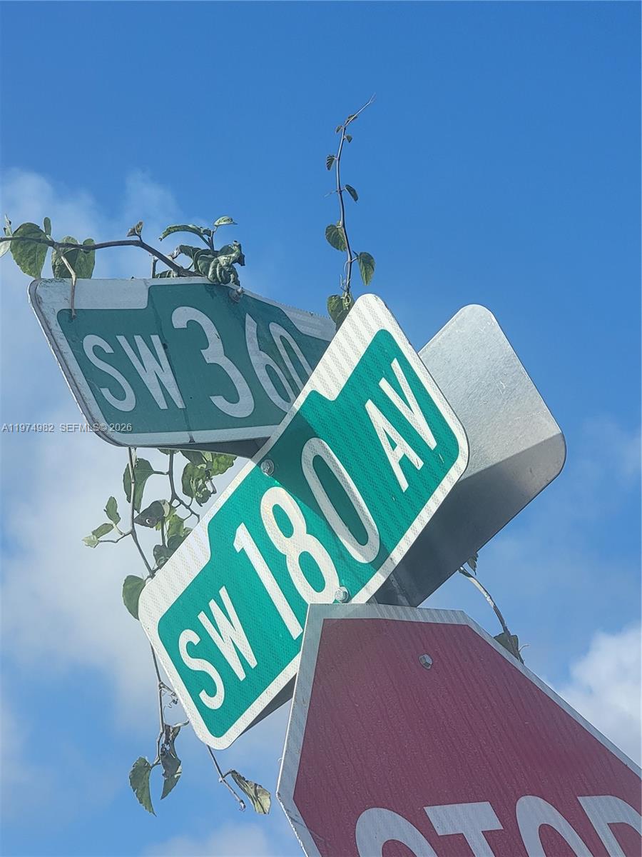 18150 Southwest 368th Street Homestead, FL 33034 - Photo 17 of 21 a view of a room with gym equipment
