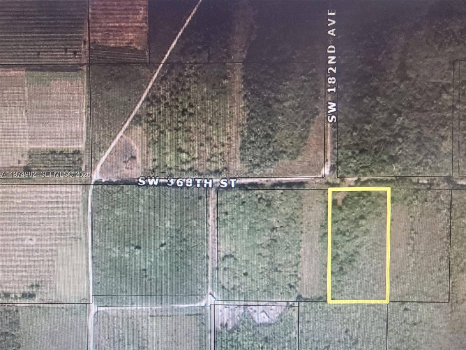 18150 Southwest 368th Street Homestead, FL 33034 - Photo 2 of 21 a bathroom with a shower