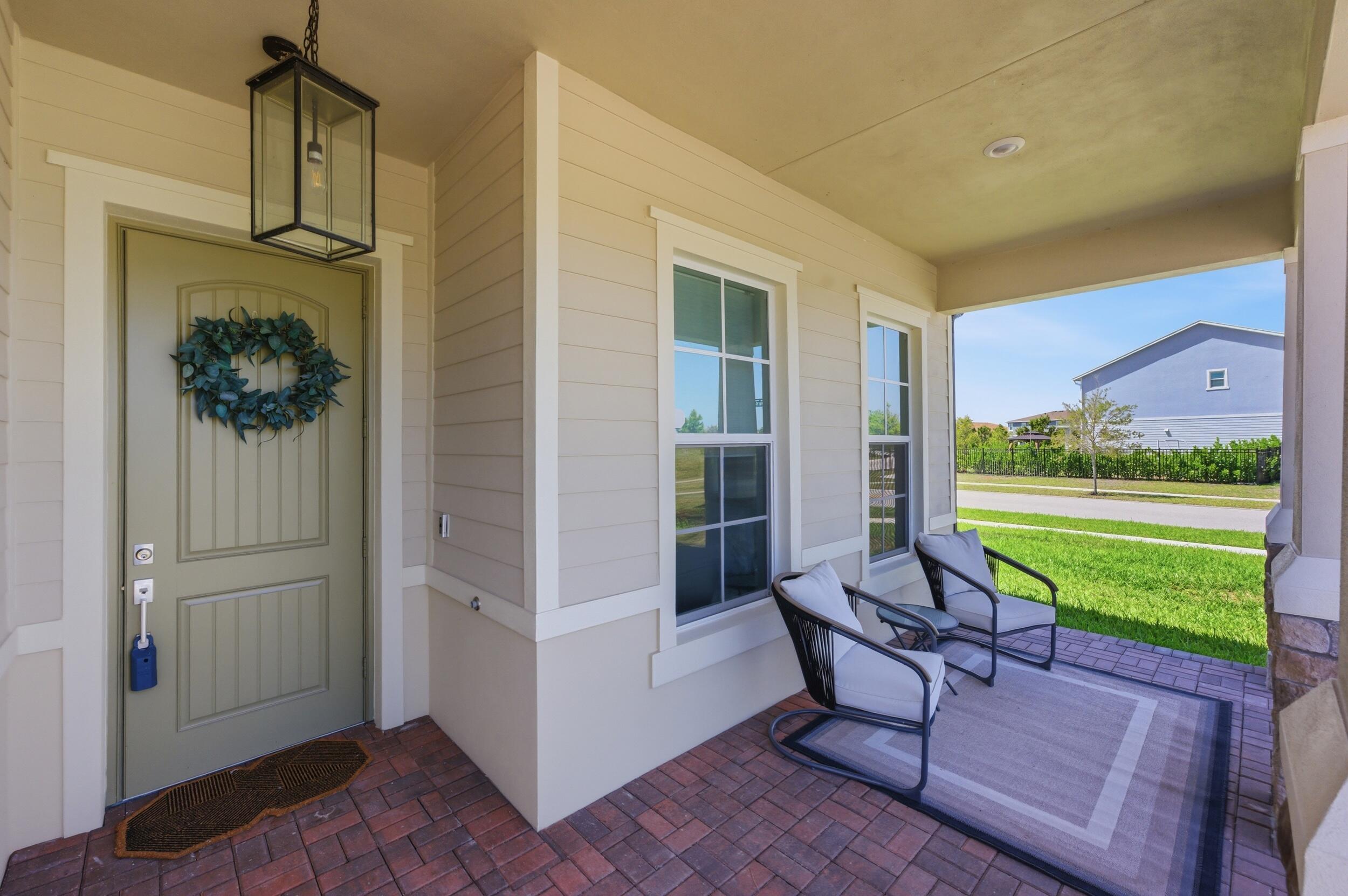 19230 Rolling Acres Road Loxahatchee, FL 33470 - Photo 41 of 58 a house view with a outdoor space