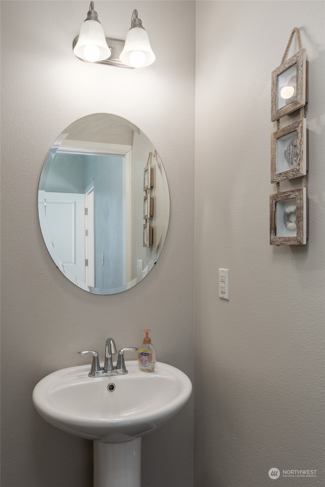 1544 Craig Road Southeast Olympia, WA 98501 - Photo 12 of 31 a bathroom with a sink and a mirror