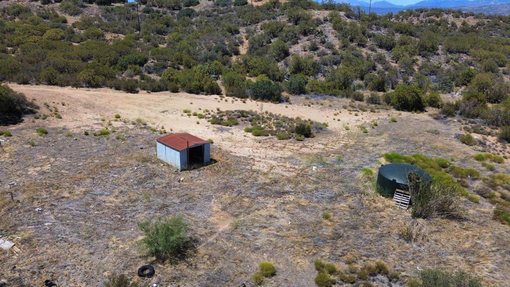46400 Terwilliger Road Anza, CA 92539 - Photo 4 of 10 a view of a dry yard with trees