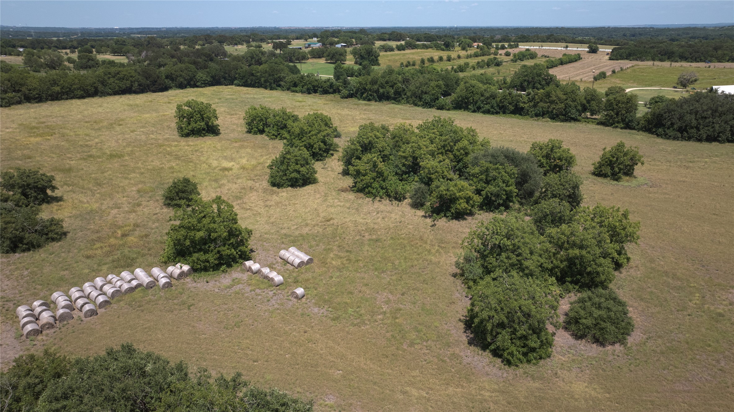 Tbd Summers Mill Road Belton, TX 76513 - Photo 13 of 21 Vast, open terrain offers a serene rural escape with scattered mature trees.