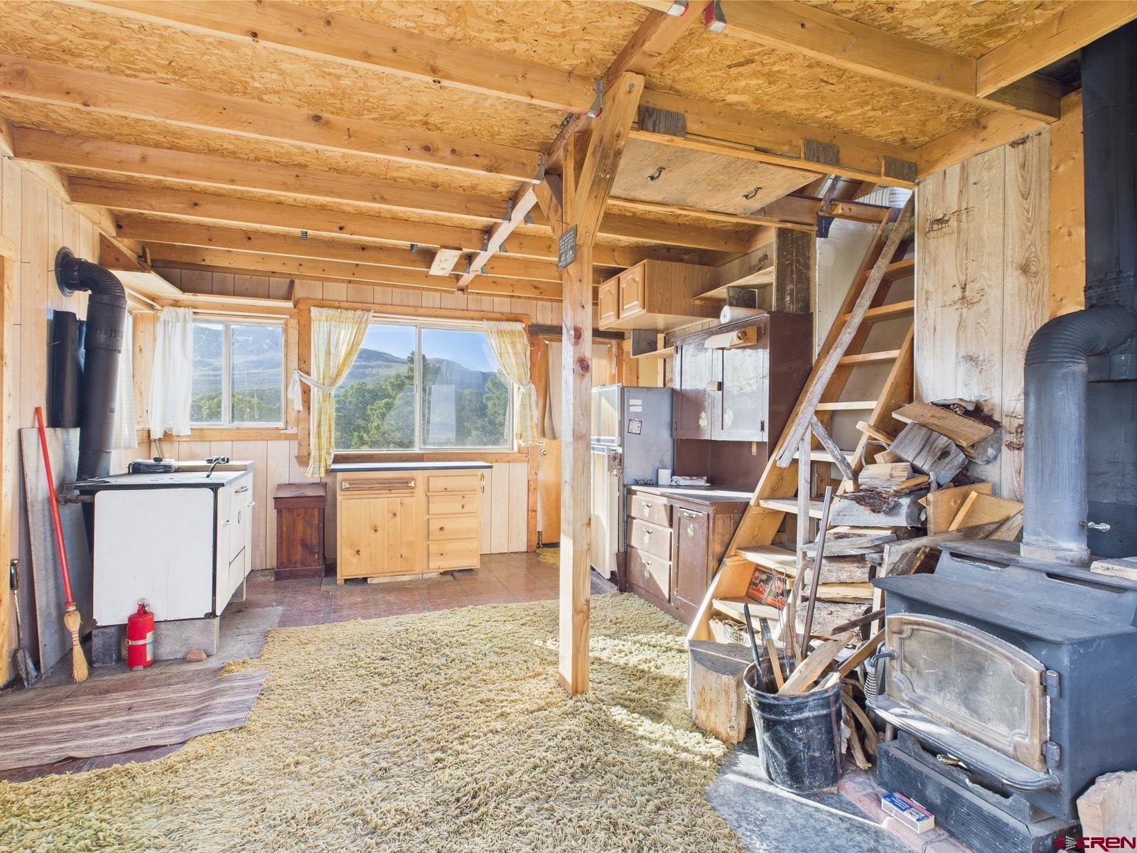 351 Slide Down Road Crawford, CO 81415 - Photo 16 of 34 a view of a room with gym equipment