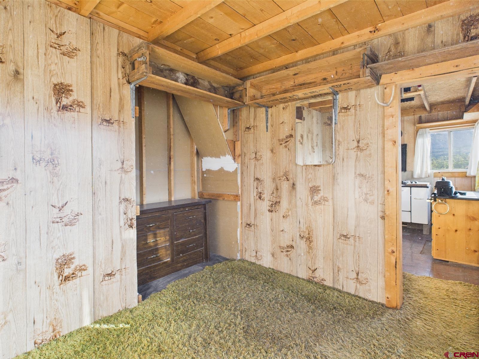 351 Slide Down Road Crawford, CO 81415 - Photo 17 of 34 a view of walk in closet
