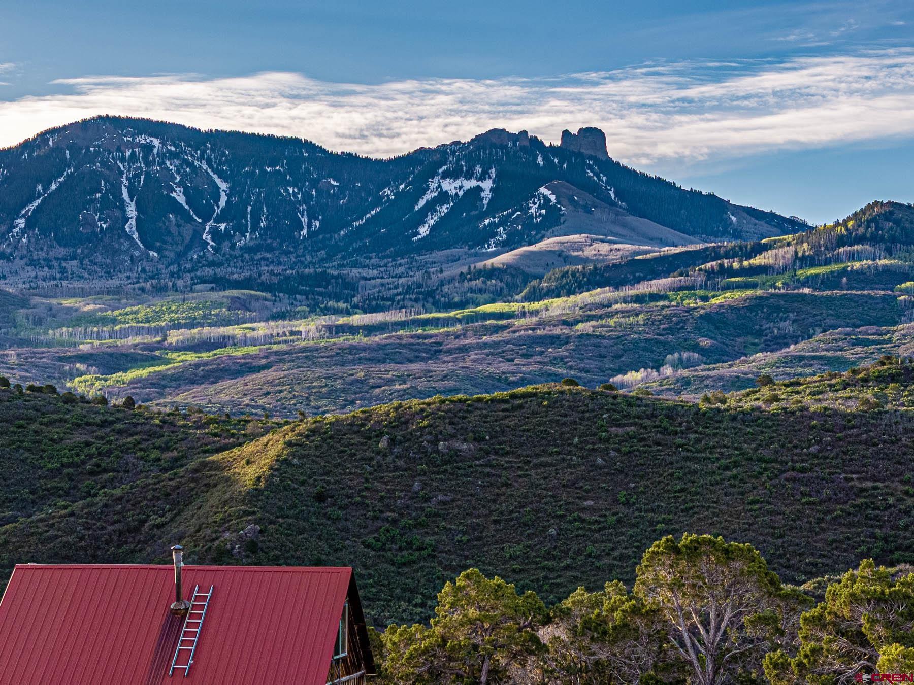 351 Slide Down Road Crawford, CO 81415 - Photo 24 of 34 a view of a street with an ocean view