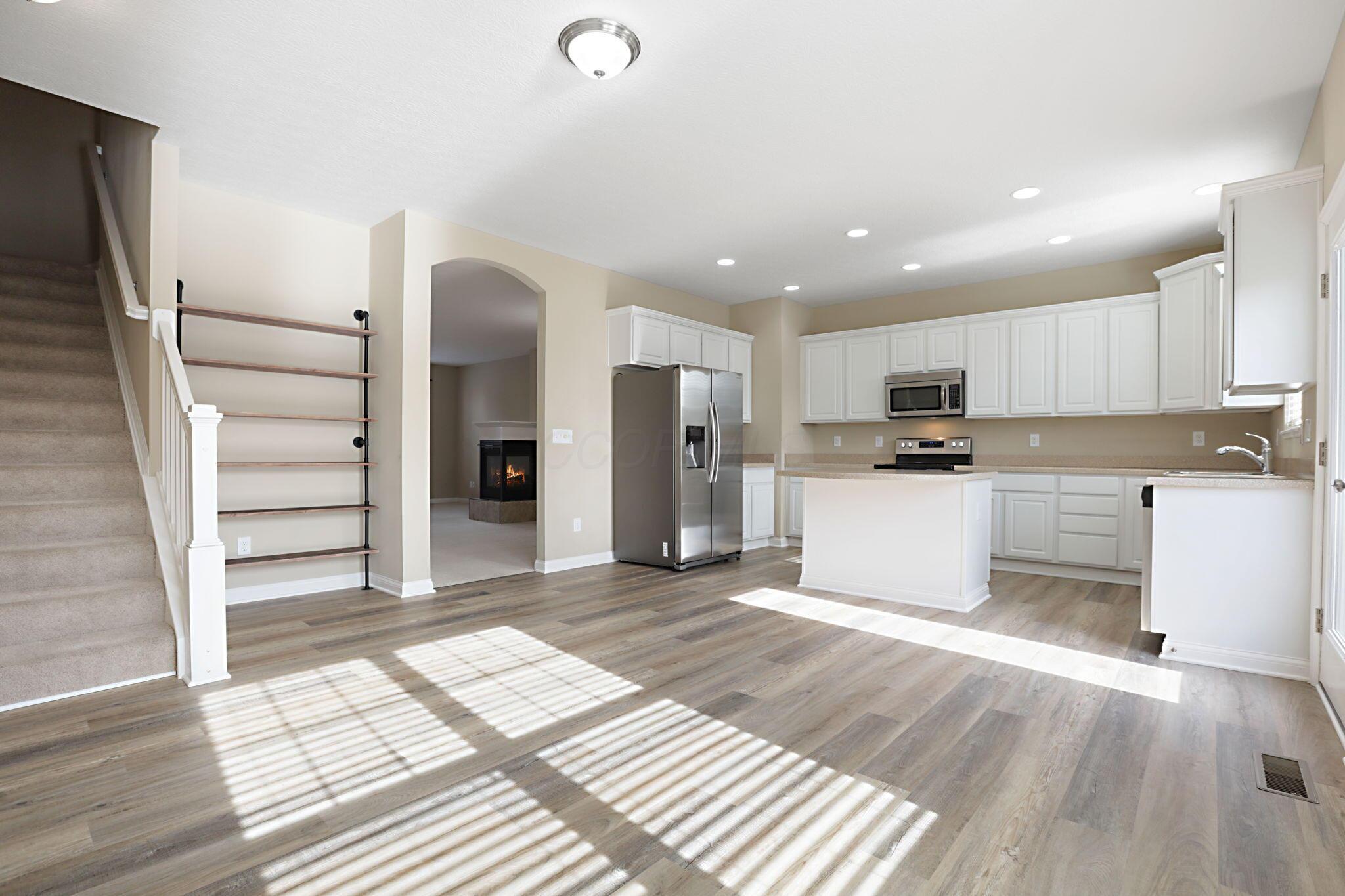 6313 Chetti Drive Columbus, OH 43213 - Photo 17 of 88 Kitchen with New Plank Floors