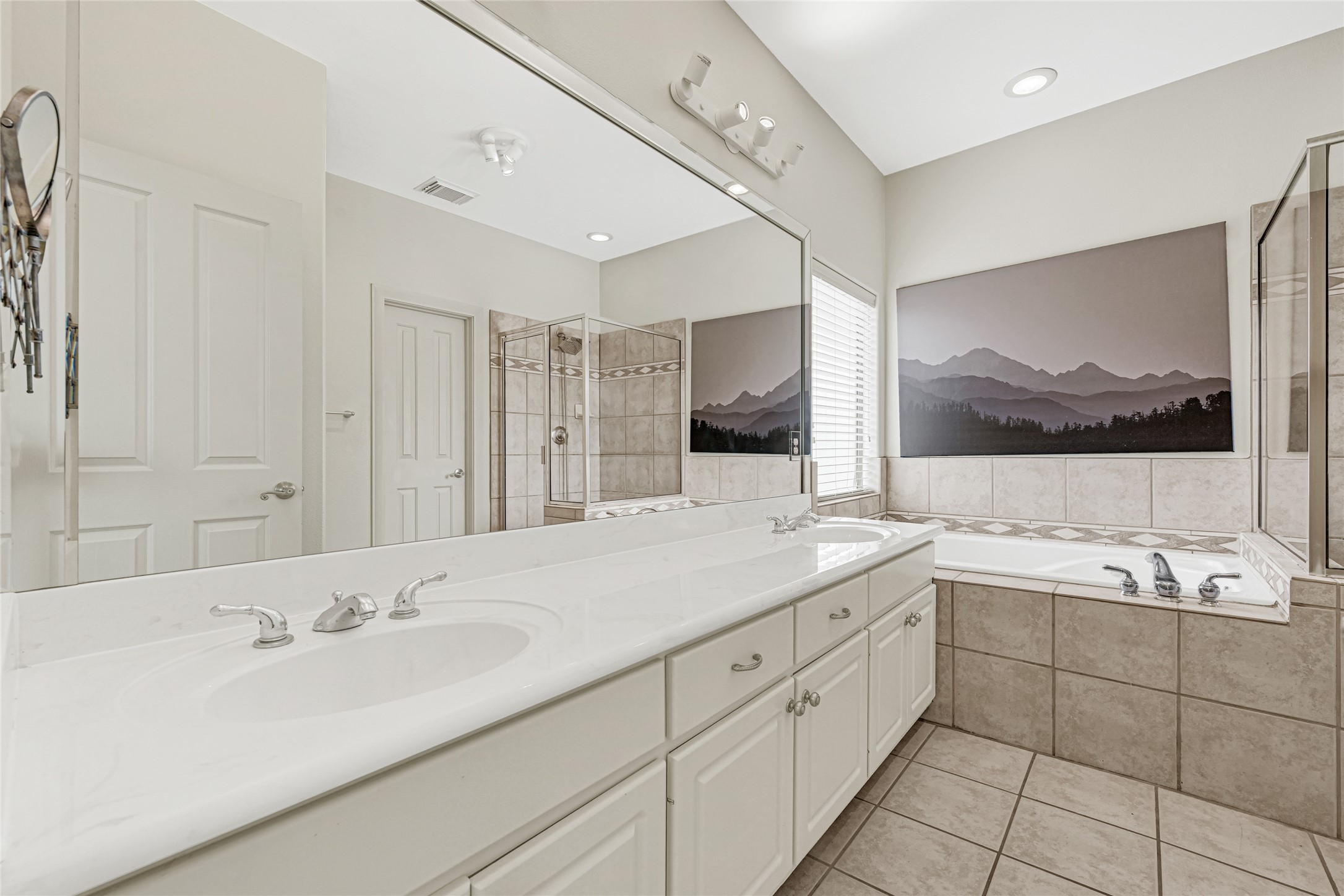 2414 Calumet Street, Unit B Houston, TX 77004 - Photo 19 of 27 a bathroom with a double vanity sink mirror and double