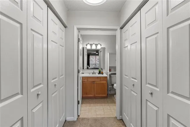 a view of a bathroom from the hallway