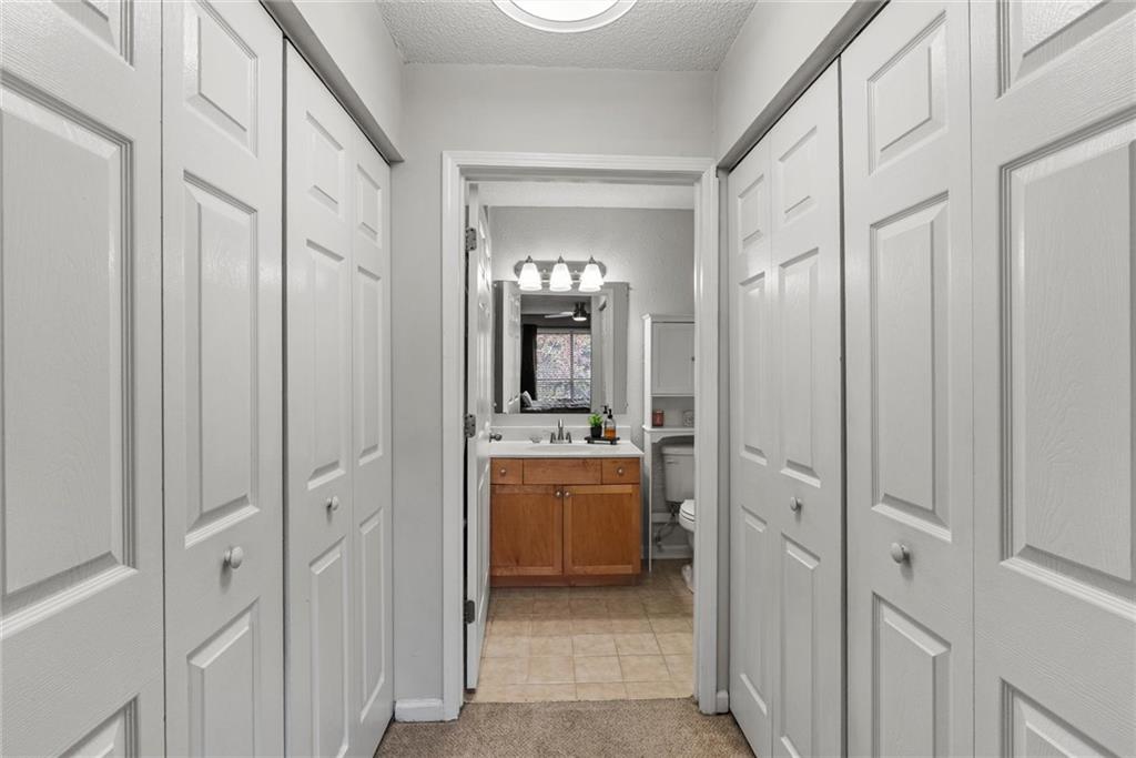 2657 Lenox Road Northeast, Unit L 163 Atlanta, GA 30324 - Photo 15 of 34 a view of a bathroom from the hallway