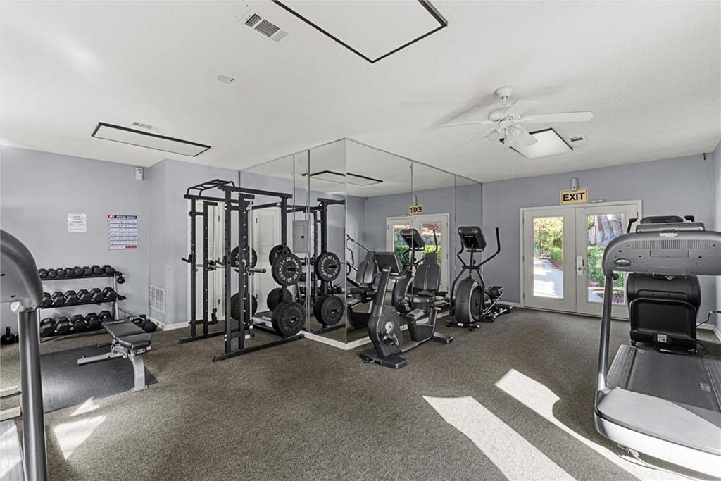 2657 Lenox Road Northeast, Unit L 163 Atlanta, GA 30324 - Photo 23 of 34 a view of a room with gym equipment