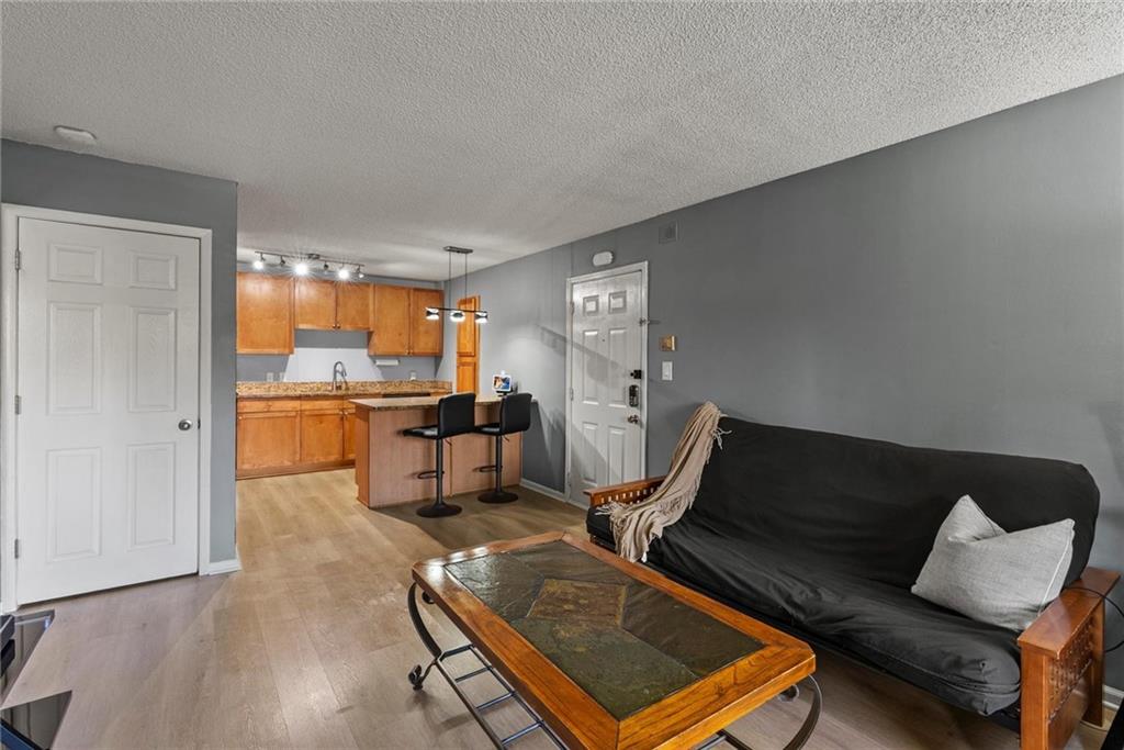 2657 Lenox Road Northeast, Unit L 163 Atlanta, GA 30324 - Photo 4 of 34 a living room with furniture